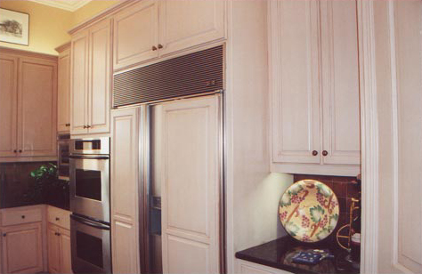Antique glazed cabinets in the kitchen area