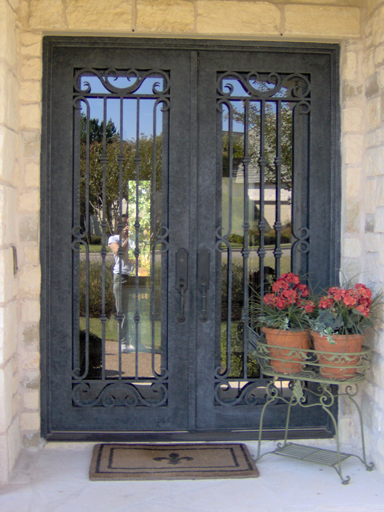 Door with metal patina faux finish