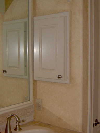 Plaster with aged faux finish details in Master Bath