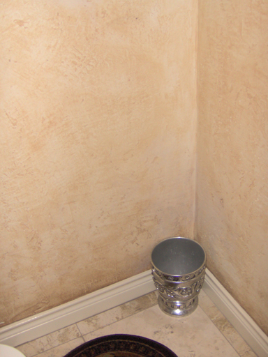Aged plaster faux painting in detail Powder Bath