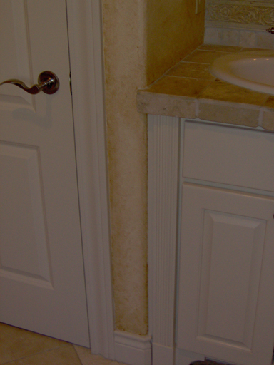 Plaster with aged faux finish detail in the Master Bath