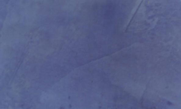Close-up of a Venetian Plaster faux finish in a Behr color called Lake Como.